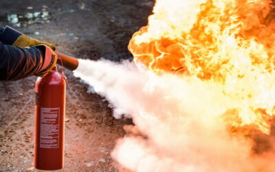 How should a fire extinguisher be used?